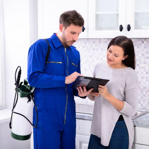 True Blue Pest Control technician confirming end of lease pest control and flea spray service with Sydney tenant. True Blue Pest Control technician confirming end of lease pest control and flea spray service with Sydney tenant.